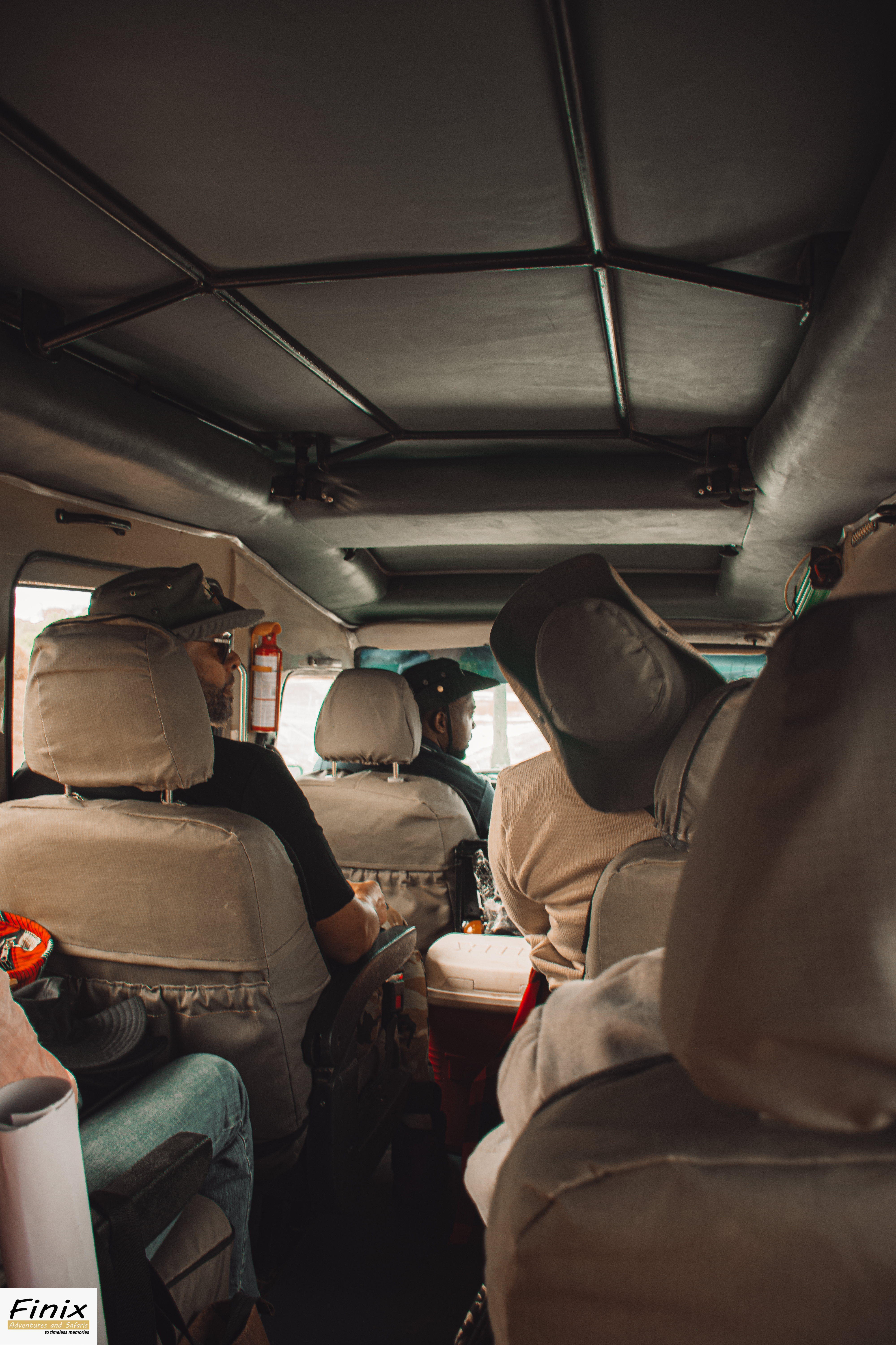 Safari essentials inside a Maasai Mara game drive vehicle